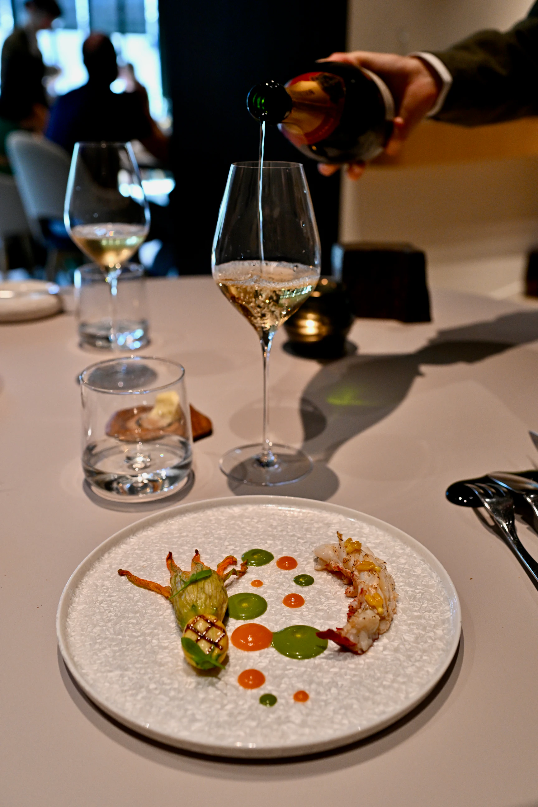 Lobster with stuffed courgette flower and shellfish emulsion at Arbane